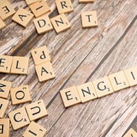 Scrabble letters spelling out the word "English"