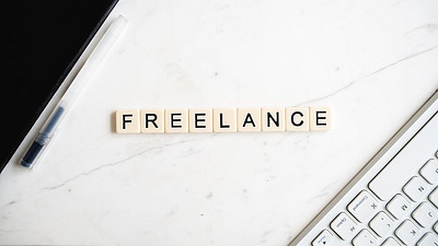 The word "freelance" spelled using Scrabble tiles