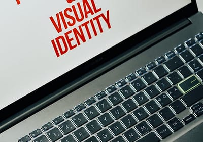 An image of a laptop screen showing branding words
